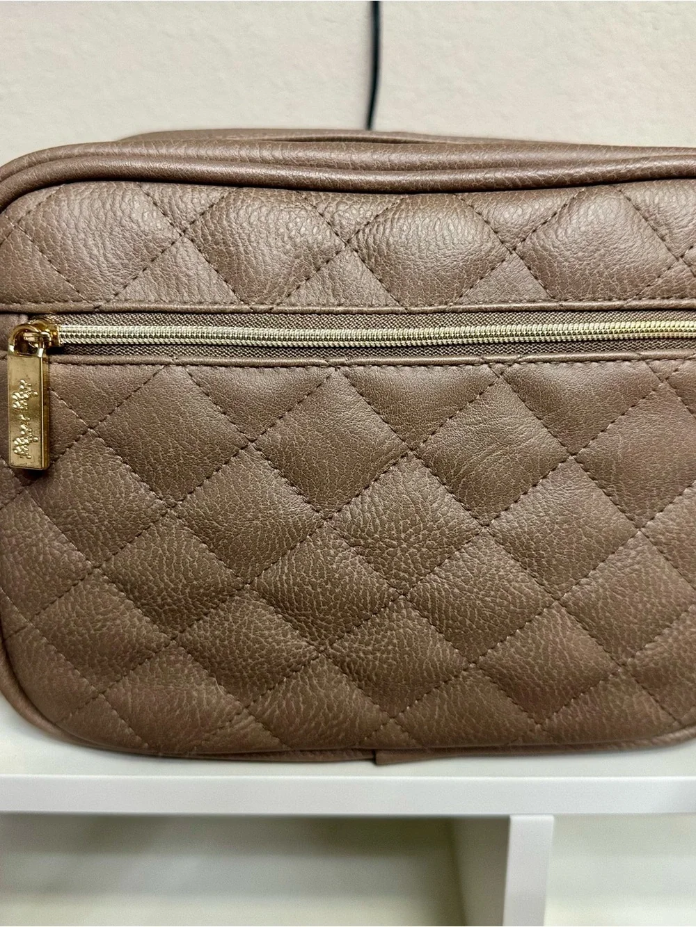 Itzy Ritzy Quilted Crossbody Bag in Taupe with Woven Strap